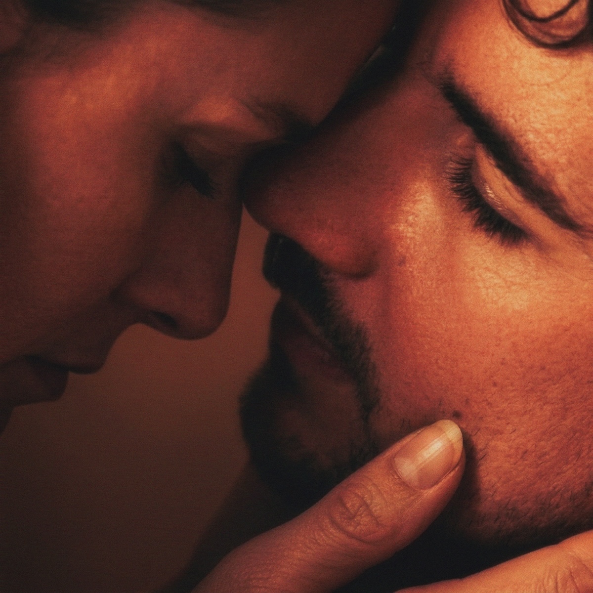 Single artwork for Noah Hill's song Bye Baby, featuring an intimate close-up profile of a couple touching foreheads in warm lighting.